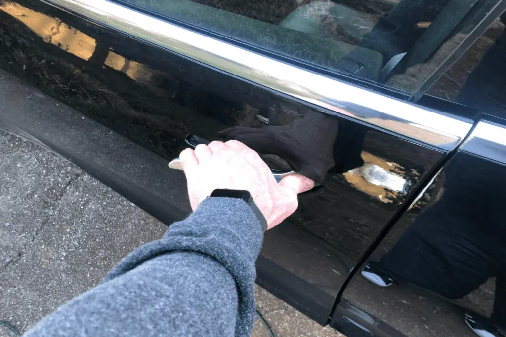 how to open tesla model 3 passenger door from inside